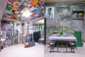 Area ruang tengah bergaya minimalis dan Ruang makan tak lepas dari aksen lukisan